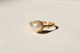 55 Bague solitaire en or jaune et perle de culture 58 Facettes 3965