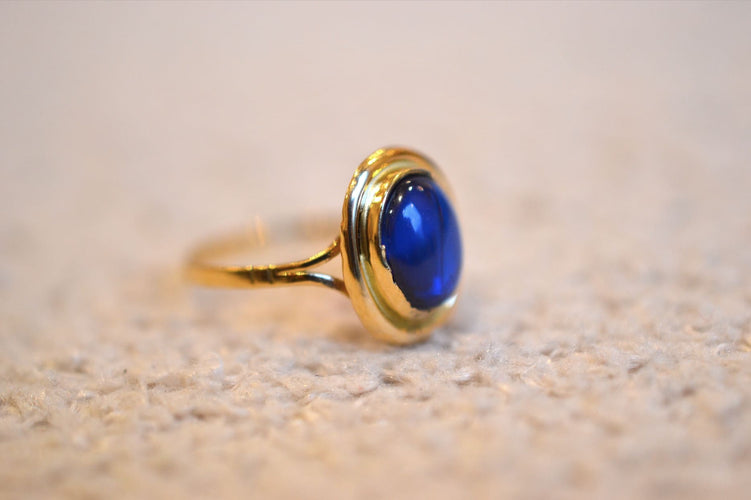 53 Bague ovale en or jaune 18 carats et pierre bleue 58 Facettes 3074