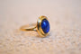 53 Bague ovale en or jaune 18 carats et pierre bleue 58 Facettes 3074