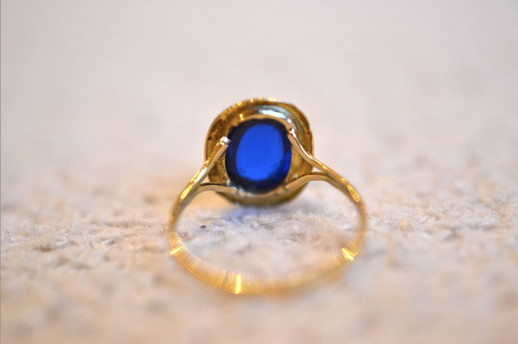 53 Bague ovale en or jaune 18 carats et pierre bleue 58 Facettes 3074