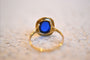 53 Bague ovale en or jaune 18 carats et pierre bleue 58 Facettes 3074