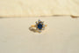 52 Bague marguerite saphir ovale et diamants en or jaune 58 Facettes 4116