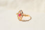 56 Bague marquise en or bicolore 18 carats et rubis 58 Facettes 4138