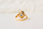 50 Bague marguerite ovale en or jaune, saphir et diamants 58 Facettes 4173