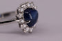 54 Bague halo en or blanc avec saphir de Ceylan et diamants 58 Facettes ME-SAPH-01