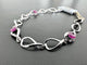 Bracelet moderne belge en or blanc, diamants et rubis 58 Facettes BR1508