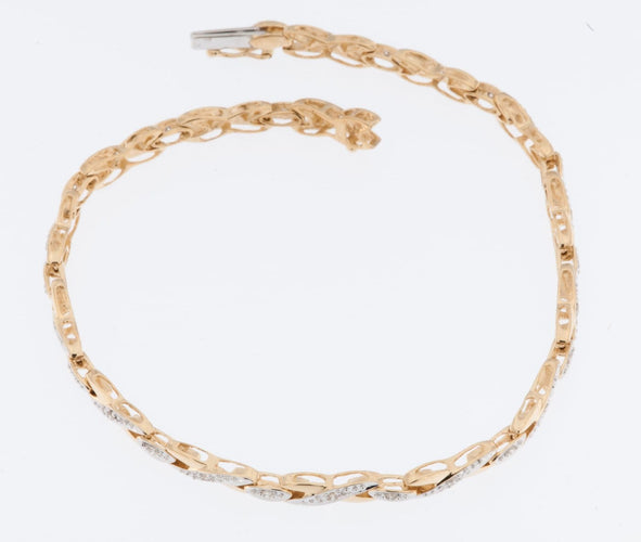 Bracelet français vintage en or jaune et blanc 18 carats avec diamants 58 Facettes BR1510