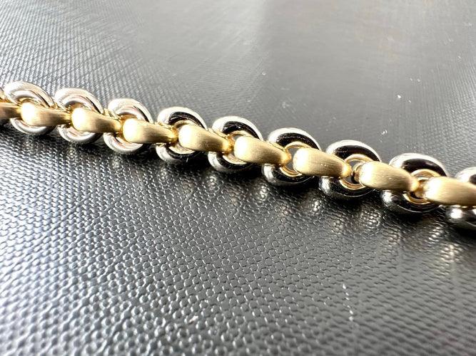 Bracelet à maillons en or jaune et or blanc 18 carats 58 Facettes BR1511