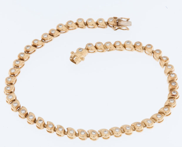 Bracelet tennis en or jaune 18 carats avec diamants 58 Facettes BR1513