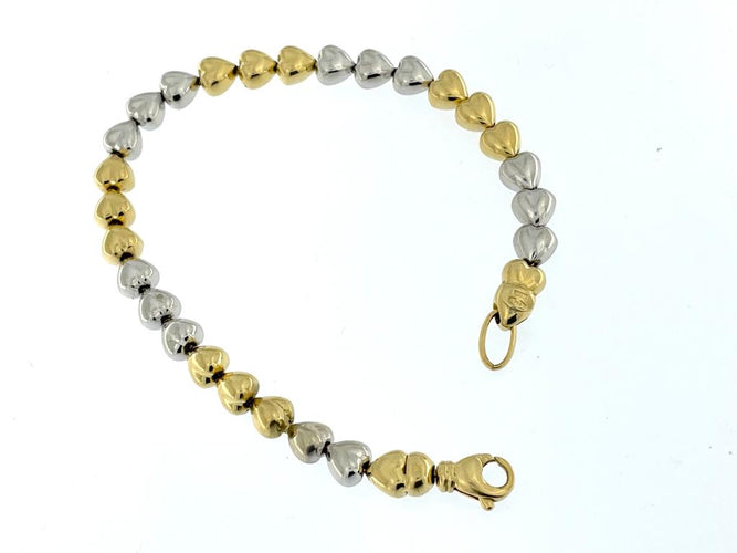 Bracelet italien en or jaune et blanc 18 carats 58 Facettes BR1533