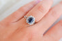 https://cdn.shopify.com/s/files/1/0963/7950/2920/files/bague-marguerite-or-saphir-diamants.jpg?v=1785314263