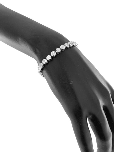 Bracelet tennis italien en or blanc et diamants 58 Facettes BR1551D
