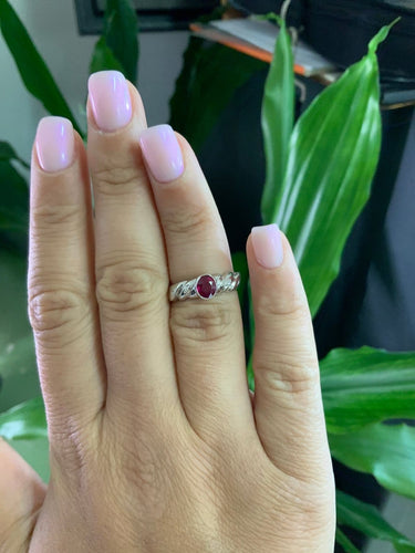 51 Bague ovale torsadée en or blanc, rubis et diamant 58 Facettes BA 789