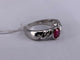 51 Bague ovale torsadée en or blanc, rubis et diamant 58 Facettes BA 789