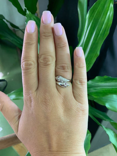 53.5 Bague double serpent en or blanc, rubis et diamants 58 Facettes BA 231