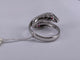 53.5 Bague double serpent en or blanc, rubis et diamants 58 Facettes BA 231