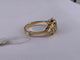 52 Bague serti clos en or jaune avec rubis ovale et diamants 58 Facettes BA 4