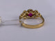 52 Bague serti clos en or jaune avec rubis ovale et diamants 58 Facettes BA 4