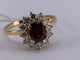 54 Bague marguerite en or jaune avec rubis sang de pigeon et diamants 58 Facettes BA 507