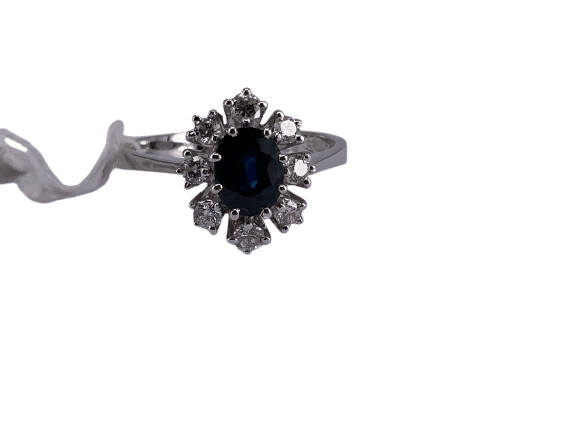 52 Bague marguerite en or blanc avec saphir et diamants 58 Facettes BA 429