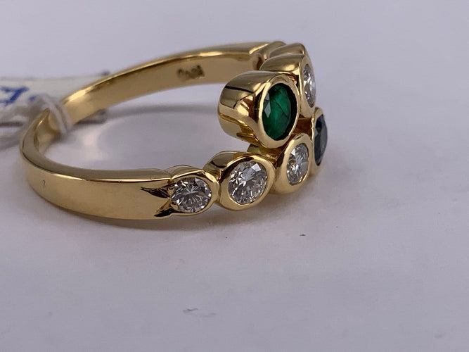 54 Bague Toi et Moi en or jaune, émeraude, saphir et diamant 58 Facettes BA 70