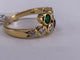 54 Bague Toi et Moi en or jaune, émeraude, saphir et diamant 58 Facettes BA 70