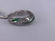 52 Bague torsadée en or blanc, émeraude et diamant 58 Facettes BA 644