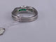 52 Bague torsadée en or blanc, émeraude et diamant 58 Facettes BA 644