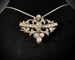 Belle Époque - Broche pendentif en or jaune, platine et diamants 58 Facettes Broche 2