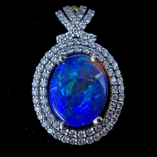 Pendentif en or blanc 14 carats, opale bleue et diamants 58 Facettes Pendentif 5