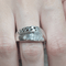 57 Bague en or blanc avec diamants noirs et blancs 58 Facettes S100