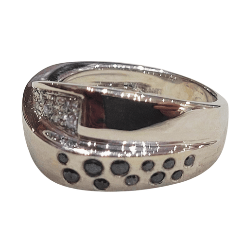 57 Bague en or blanc avec diamants noirs et blancs 58 Facettes S100