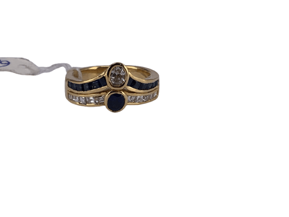 Bague double couronne en or jaune avec diamant et saphir