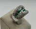 53 Bague en or gris pavée de diamants et émeraudes calibrées 58 Facettes 326/96
