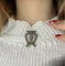 Broche Lira - Broche en or jaune et argent, diamants 58 Facettes