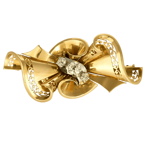 Broche Nœud en or jaune, or gris et diamants
