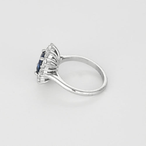 53 Bague marguerite en or blanc, saphir non chauffé et diamants 58 Facettes EB12