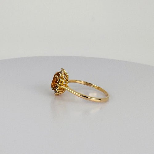 https://cdn.shopify.com/s/files/1/0829/5212/6812/files/Vintage14KYellowGoldEntourageRingwithCitrineside.jpg?v=1785918402