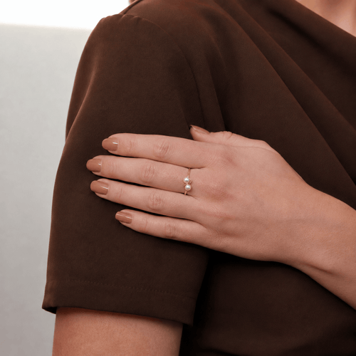 https://cdn.shopify.com/s/files/1/0829/5212/6812/files/Vintage_14K_Yellow_Gold_Two_Pearl_Ring_on_hand.png?v=1785924434