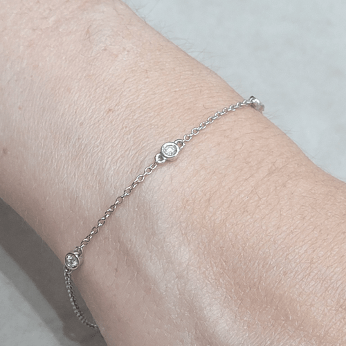 Bracelet en or blanc 18k et diamants 58 Facettes TA102