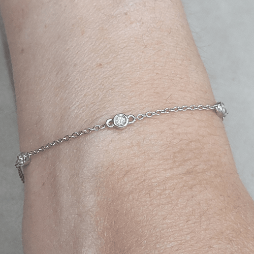 Bracelet en or blanc 18k et diamants 58 Facettes TA102