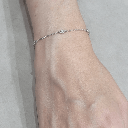 Bracelet en or blanc 18k et diamants 58 Facettes TA102