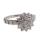 55 Bague rosette en or blanc et diamants 58 Facettes S309