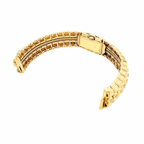 Montre Lacloche - Montre bracelet secrète en or jaune et diamants 58 Facettes 35877