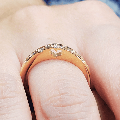 54 Bague en or rose 18 ct et diamants 58 Facettes S76