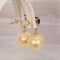 Boucles d'oreilles Boucles d'oreilles en or jaune 14 ct, grenats cœur et perles 58 Facettes E035