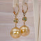 Boucles d'oreilles Boucles d'oreilles en or jaune, émeraudes, diamants et perles des Mers du Sud 58 Facettes E0038