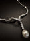 Collier en or blanc avec perle et diamants 58 Facettes COL80
