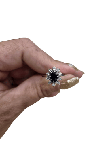 Bague 50 Bague en or blanc avec saphir bleu et brillants 58 Facettes STBO112F