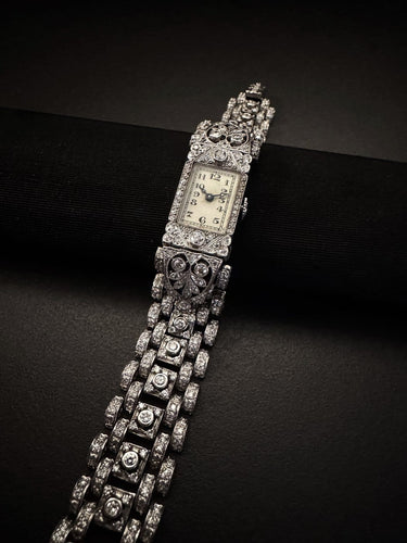 Liberty - Montre en platine, or blanc et diamants 58 Facettes ORL4523PT